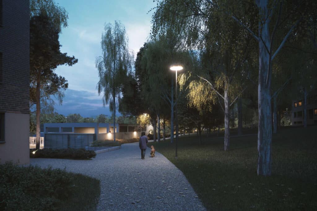 Havainnekuva Pohjantorista iltahämärässä puiston puolelta